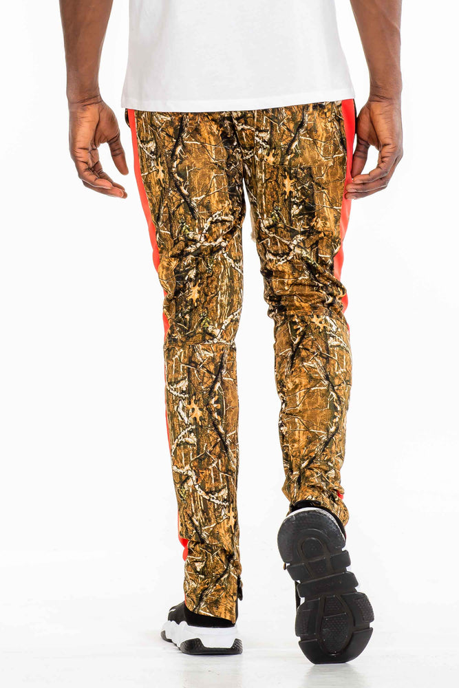 
                  
                    Load image into Gallery viewer, Riley Hunter Camo Track Pants
                  
                